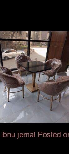 THE HOTEL RESTAURANT CHAIRS AND TABLES