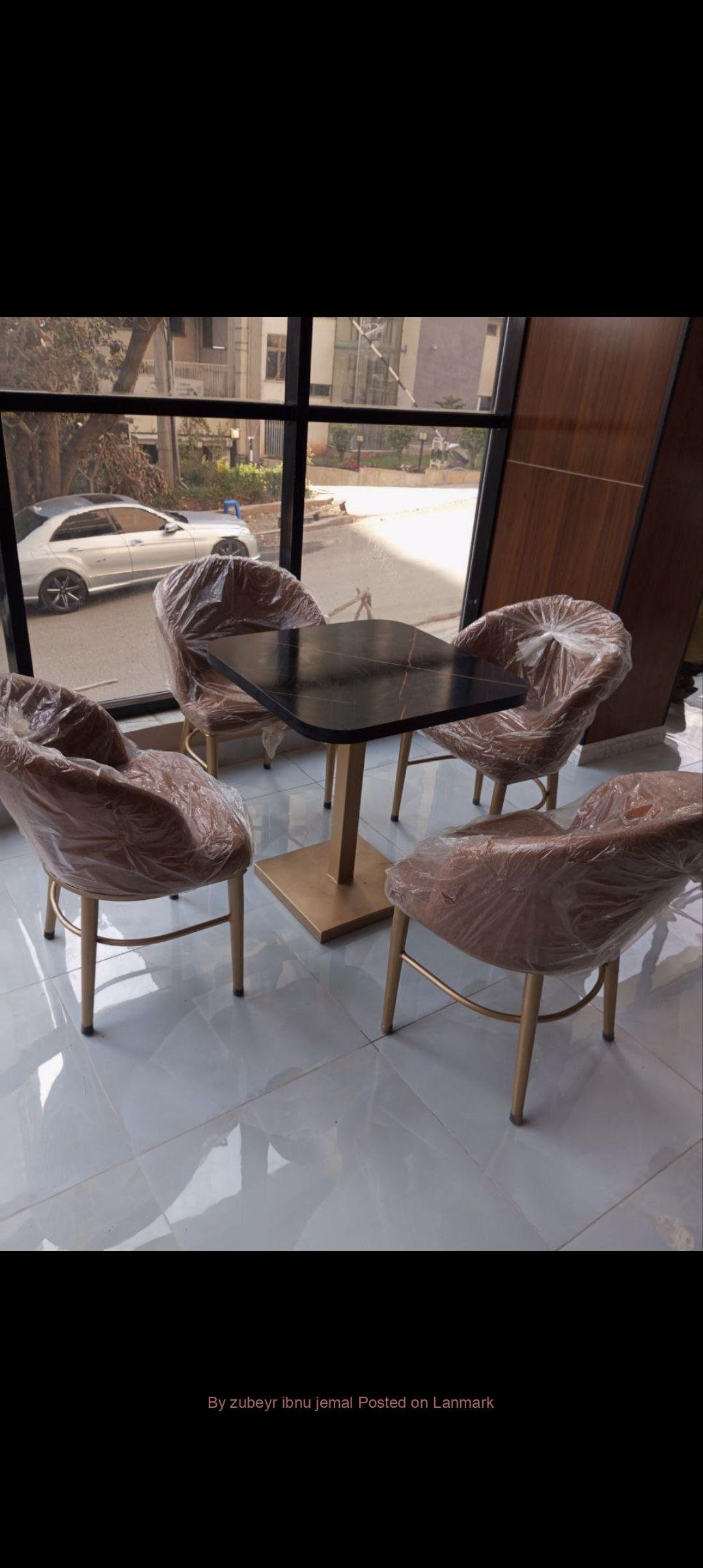 THE HOTEL RESTAURANT CHAIRS AND TABLES